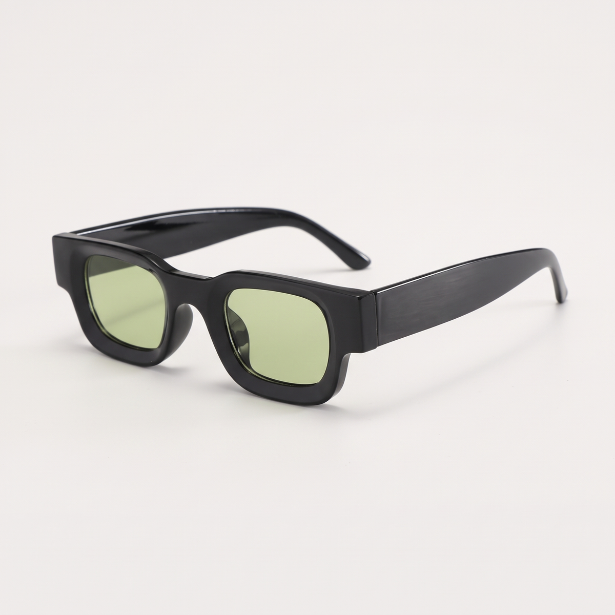 K1 Meridian sunglasses in Black / Green, three-quarter view