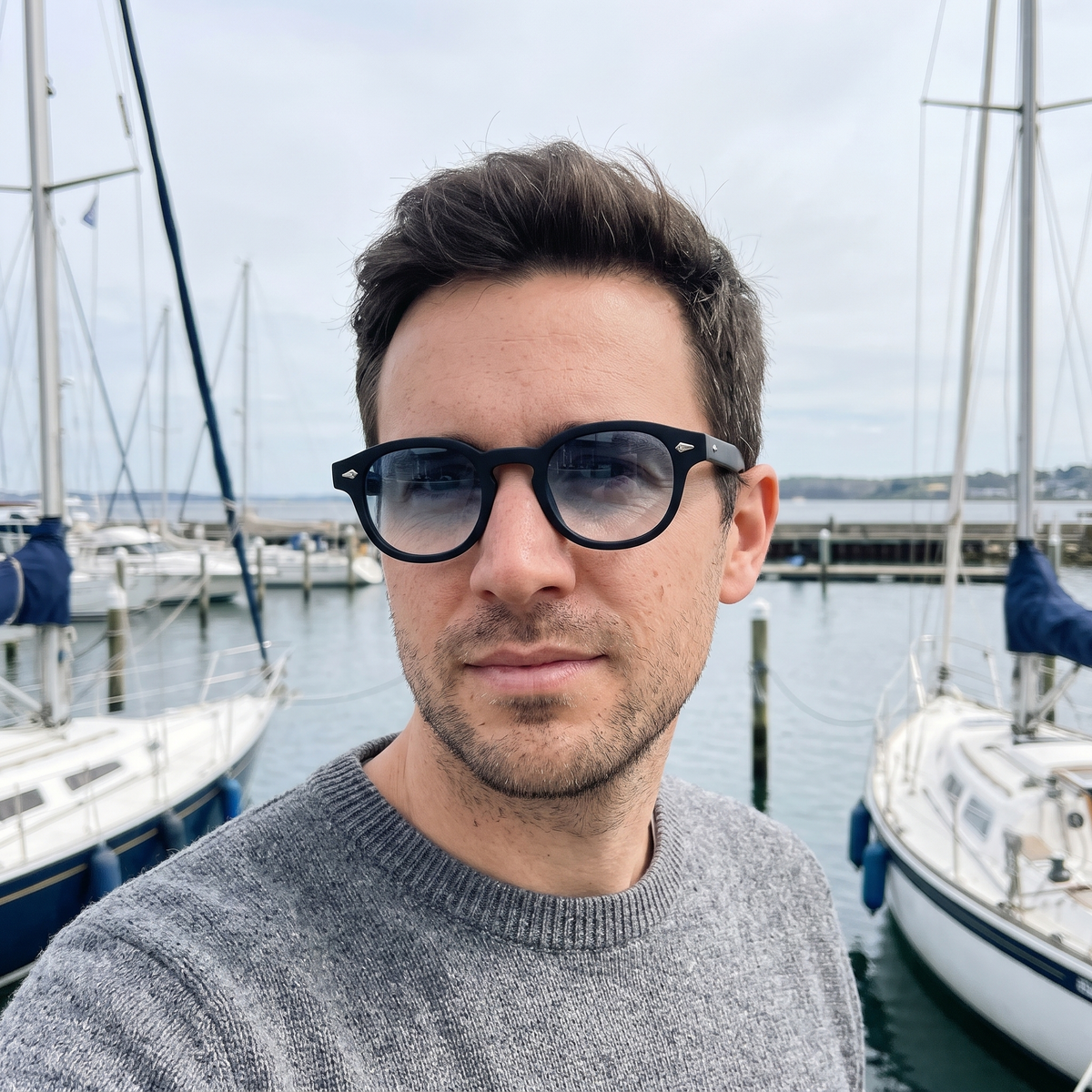 K6 Lumen sunglasses in Matte Black / Blue Gradient, worn by a man
